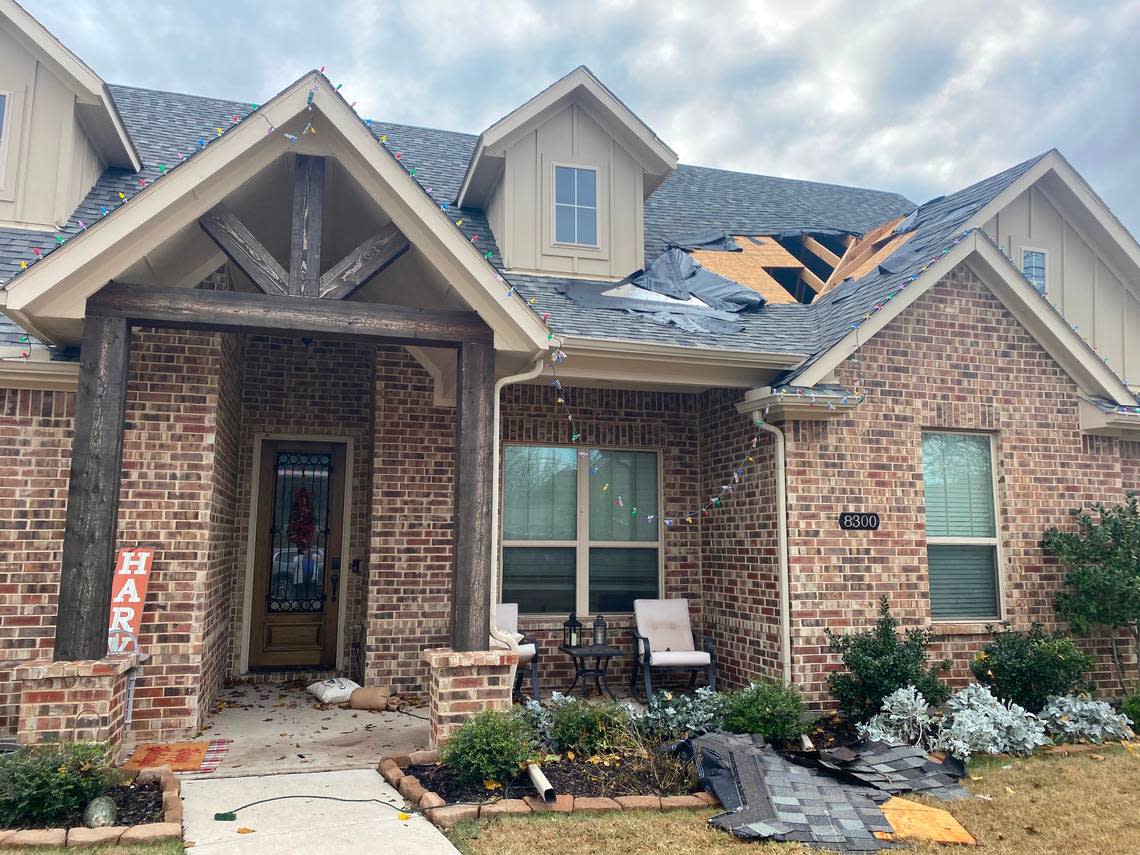 Storm damage to a home on Sayers Lane in North Richland Hills that authorities believe to be from a tornado on Tuesday, Dec. 13, 2022.