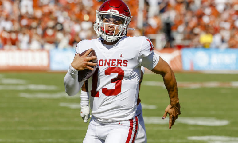 Oklahoma quarterback Caleb Williams runs against Texas.