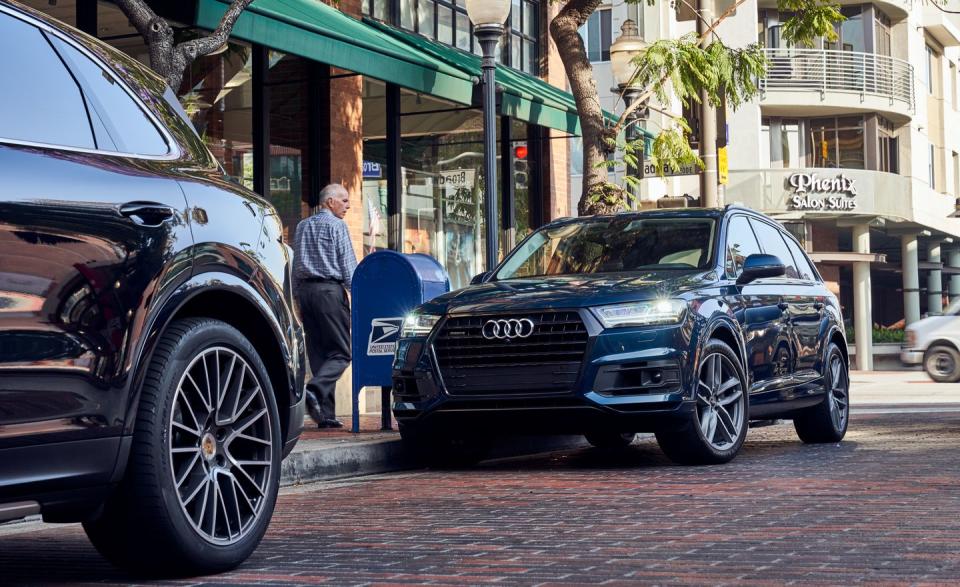 View Photos of the 2018 Audi Q7 and 2019 Porsche Cayenne