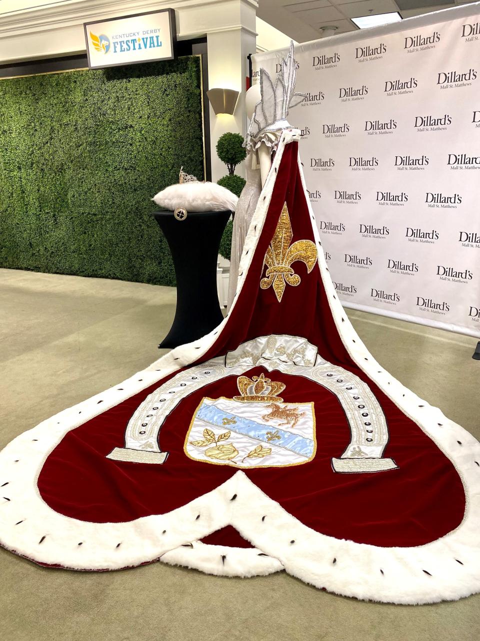 A spin of the wheel determines which member of the Kentucky Derby Festival Royal Court becomes the queen during the annual FIllies Ball.  ONce crowned, the Kentucky Derby Festival queen is drapped in a special robe.