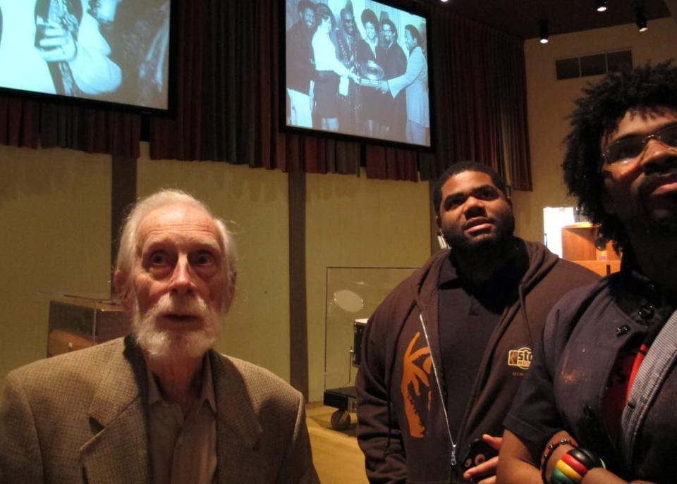 (L to R) Stax Records co-founder Jim Stewart and two Stax Music Academy instructors during an April 29, 2013, tour of the Stax Museum of American Soul Music in Memphis, Tennessee. Stewart died on Dec. 5, 2022, at the age of 92. (AP Photos/Adrian Sainz)