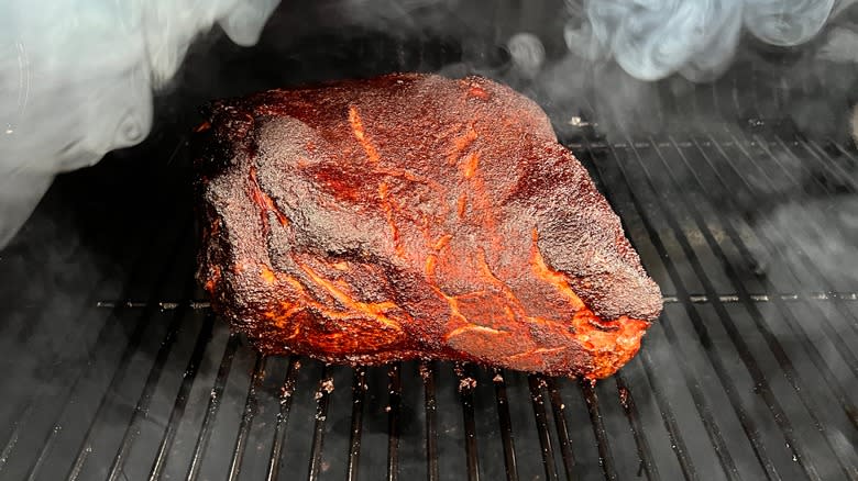 meat roasting in smoker