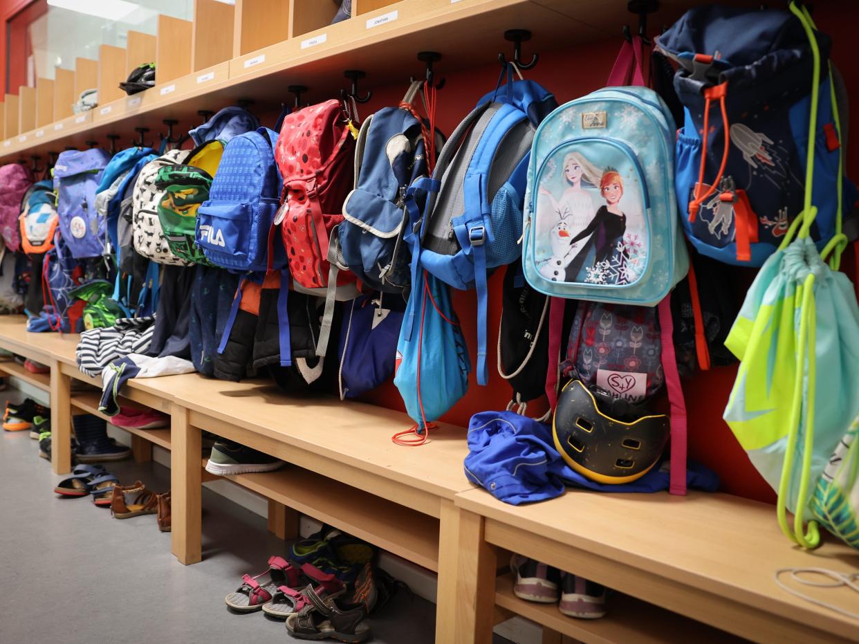 9 August 2022, Hamburg: Sports bags and school satchels hang on the coat rack outside a classroom at Wesperloh Elementary School in Hamburg-Osdorf. Photo: Christian Charisius/dpa (Photo by Christian Charisius/picture alliance via Getty Images)