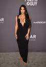 <p>Kim Kardashian chose a slick vintage Versace dress for the star-studded ceremony. <em>[Photo: Getty]</em> </p>