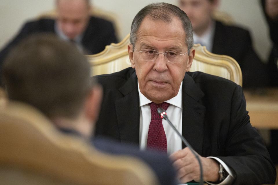 Russian Foreign Minister Sergey Lavrov speaks to OSCE Secretary General Thomas Greminger, back to camera, during their talks in Moscow, Russia, Thursday, Oct. 31, 2019. Lavrov said that Russia is ready for dialogue with the OSCE to consider response to common challenges. (AP Photo/Alexander Zemlianichenko)