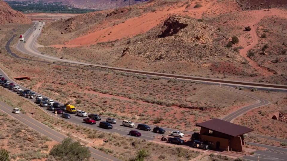 The entrance at Arches National Park on Memorial Day Weekend 2021. Timed-entry passes are now required during peak season. / Credit: CBS News