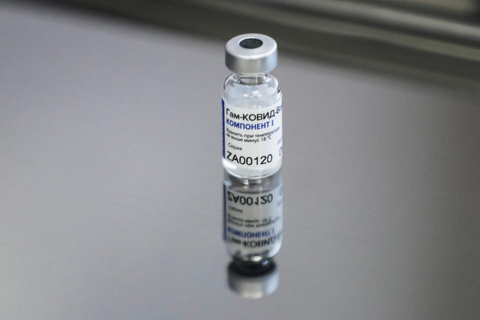 FILE - In this file photo taken Thursday, Dec. 10, 2020, a vial with Russia's Sputnik V coronavirus vaccine in a medical room before being used for a vaccination in Moscow, Russia. Belarus on Tuesday Dec. 29, 2020, has announced the start of mass coronavirus vaccinations with the Russian-developed Sputnik V shot, becoming the second country after Russia to roll out the vaccine. (AP Photo/Pavel Golovkin, FILE)