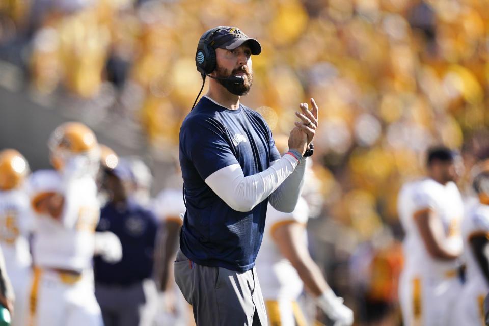 Kent State head coach Sean Lewis watches from the sideline during the first half of an NCAA college football game against Iowa, Saturday, Sept. 18, 2021, in Iowa City, Iowa. Iowa won 30-7. (AP Photo/Charlie Neibergall)