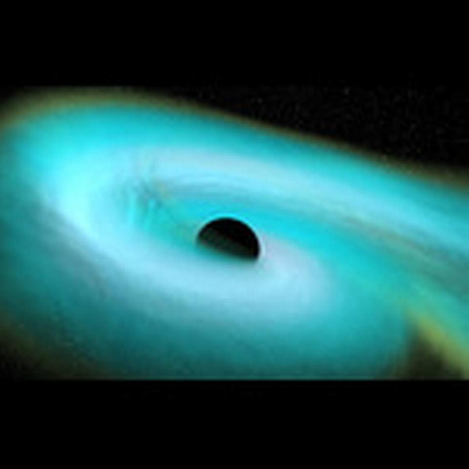 This artist’s rendition shows the disruption of a neutron star as it is swallowed whole by a black hole. The Hanford LIGO observatory helped confirm the first detections of such mergers.