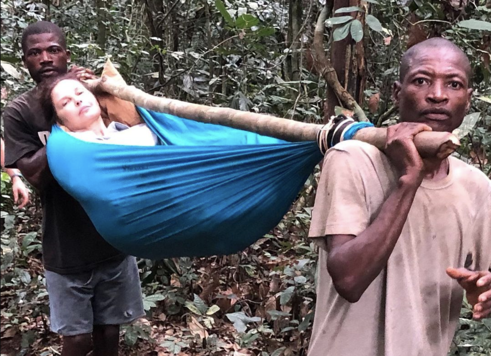 Ashley Judd being carried out of the Congo rainforest in February 2021 after tripping over a fallen tree, in the dark, and breaking her leg in four places. She had a 55-hour journey to the hospital. (Photo: Ashley Judd via Instagram)