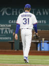 Texas Rangers starting pitcher Spencer Howard (31) is relieved in the third inning of a baseball game against the Los Angeles Angels, Thursday, Aug. 5, 2021, in Arlington, Texas. (AP Photo/Brandon Wade)