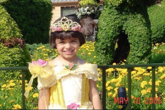 <p>rachelzegler/Twitter</p> a young Rachel Zegler dressed as Belle from Beauty and the Beast