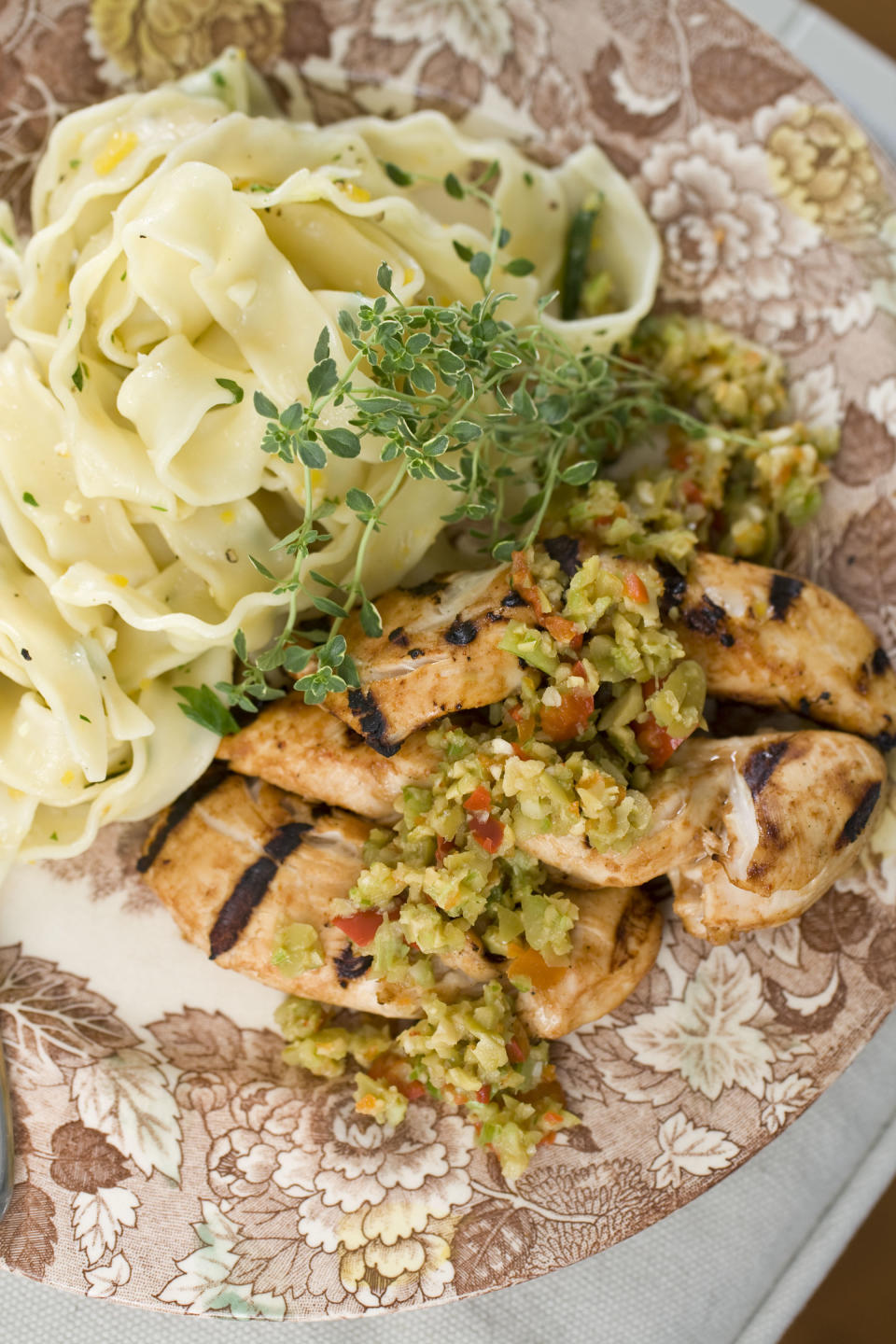 This Sept. 23, 2013 photo shows bloody mary chicken with olive-celery tapenade in Concord, N.H. (AP Photo/Matthew Mead)