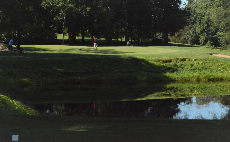 The water hazard fairway just before the green on the 11th hole at River Ridge Golf Course in Jewett City.