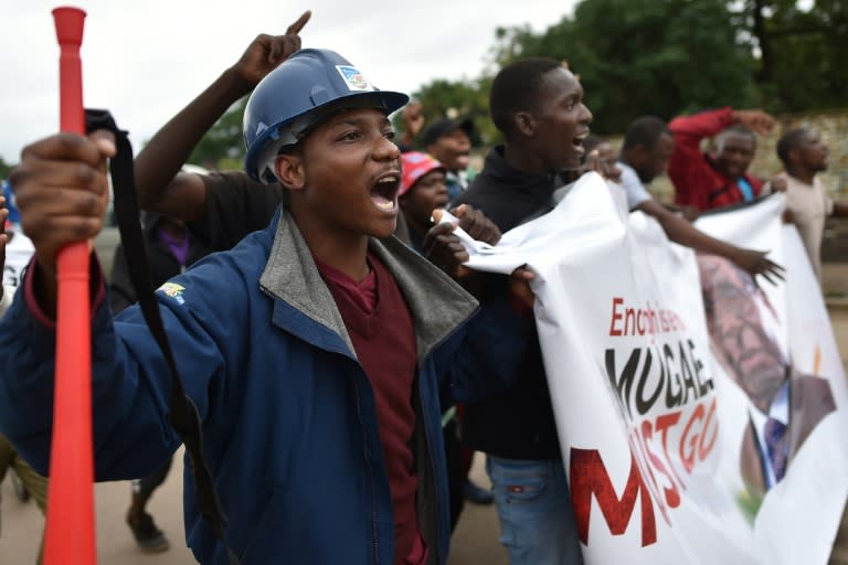 People called for Zimbabwe's president Robert Mugabe to step down during a demonstration in Harare