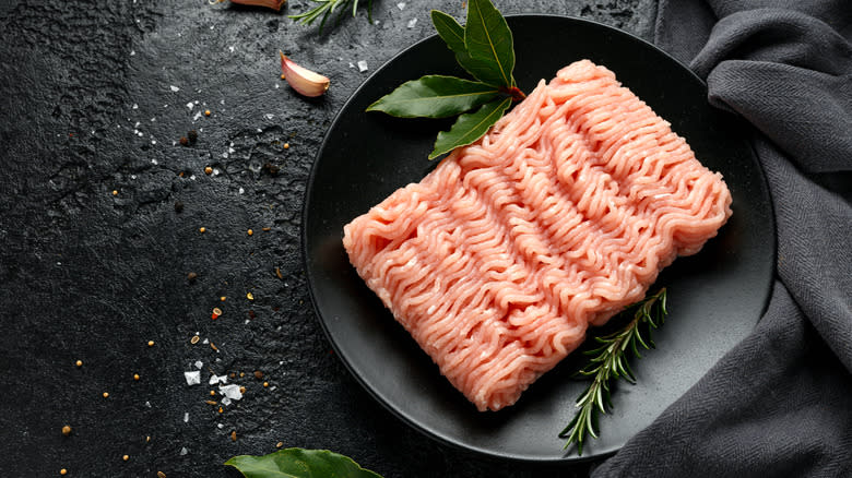 Ground turkey on black plate