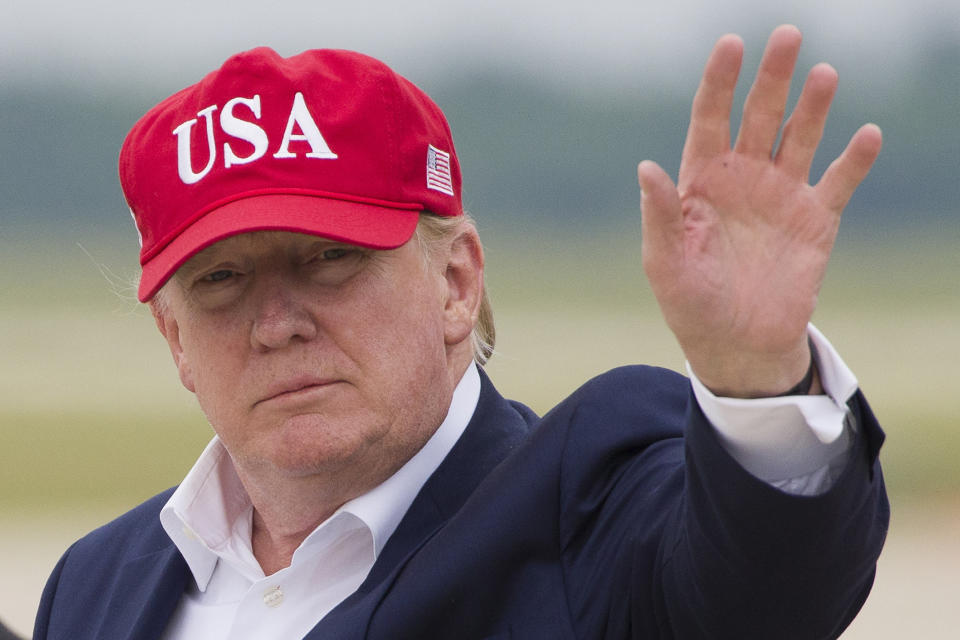 President Donald Trump waves as he steps off Air Force One after arriving, Friday, June 7, 2019, at Andrews Air Force Base, Md. (AP Photo/Alex Brandon)