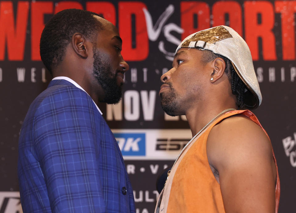 LAS VEGAS, NEVADA - OCTOBER 09: WBO welterweight champion Terence Crawford (L) and Shawn Porter (R) face-off during the press conference at MGM Grand Casino on October 09, 2021 in Las Vegas, Nevada. (Photo by Mikey Williams/Top Rank Inc via Getty Images)