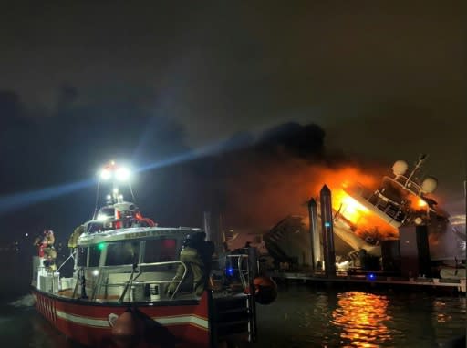 Miami firefighters struggled for two hours to douse the flames that destroyed a luxury yacht belonging to Latin singer Marc Anthony