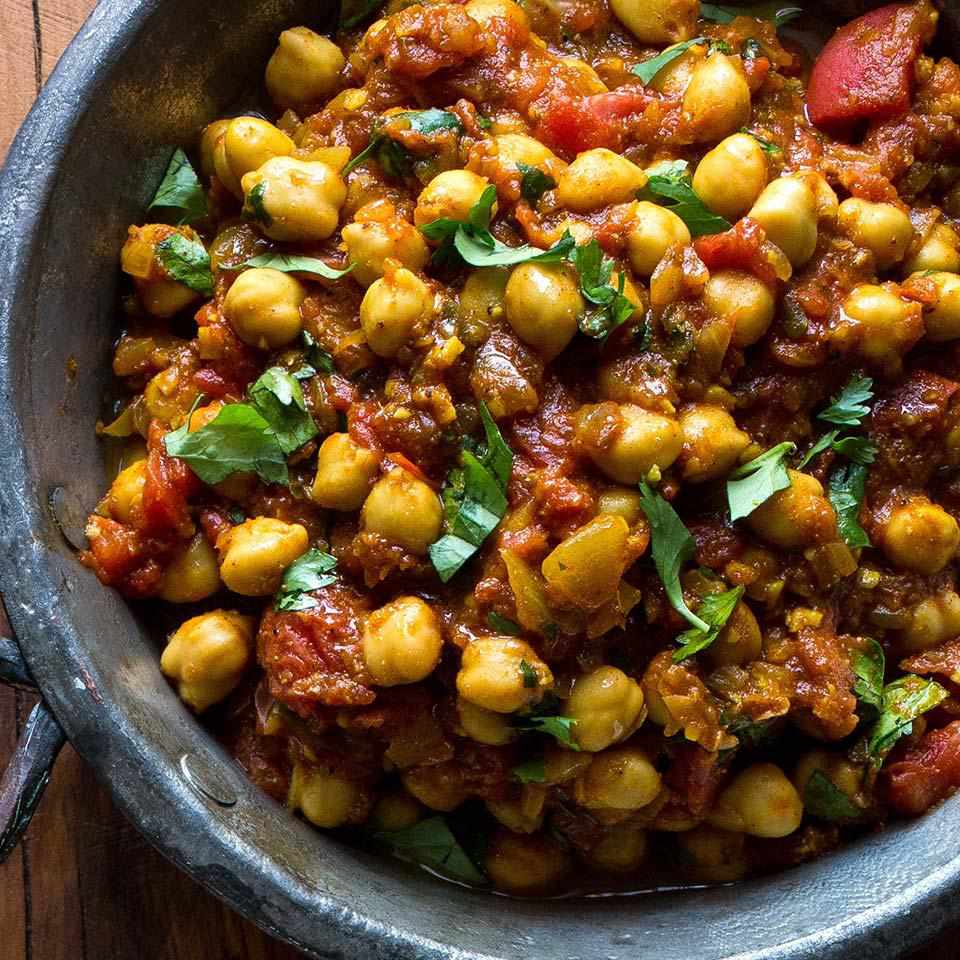 <p>Made with convenient canned beans, this quick and healthy Indian recipe is an authentic chickpea curry that you can make in minutes. If you want an additional vegetable, stir in some roasted cauliflower florets. Serve with brown basmati rice or warm naan. <a href="https://www.eatingwell.com/recipe/255186/chickpea-curry-chhole/" rel="nofollow noopener" target="_blank" data-ylk="slk:View Recipe;elm:context_link;itc:0;sec:content-canvas" class="link ">View Recipe</a></p>