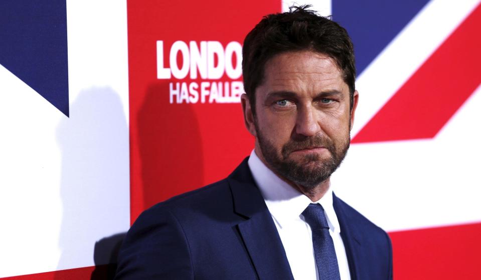 Gerard Butler poses at the premiere of the movie "London Has Fallen" at the ArcLight Cinerama Dome in Los Angeles, California