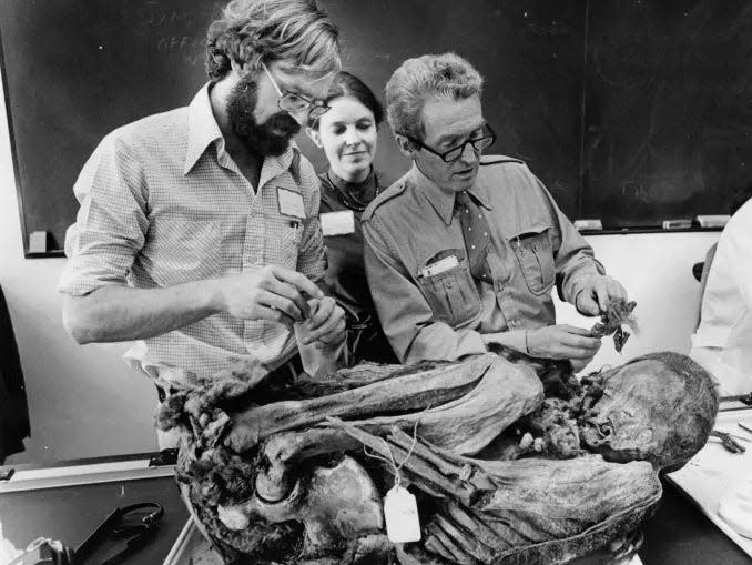 A mummified body is prepared for dissection at Harvard's Peabody Museum of Archaeology and Ethnology in 1978.