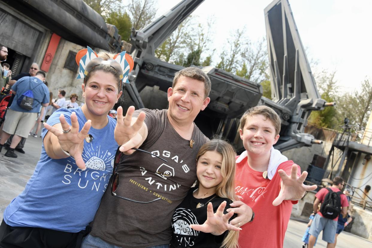 During the Batuu excursion, there's still time for things like posing for photos, shopping and drinking blue milk. (Photo: Terri Peters)