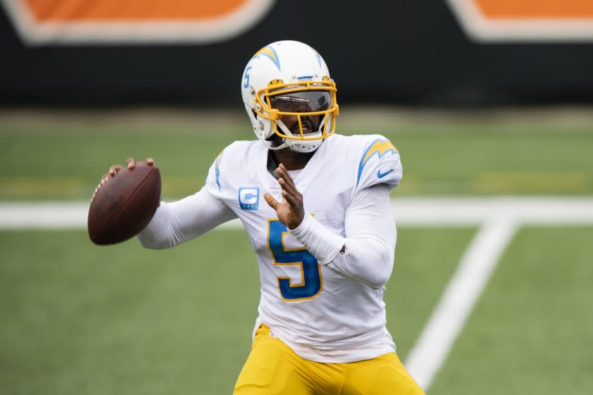 Los Angeles Chargers quarterback Tyrod Taylor (5) makes a pass during an NFL football game.