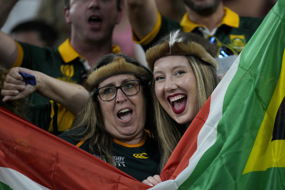 South Africa's supporters hold their national flag as they wait for the Rugby World Cup Pool B match between South Africa and Tonga at the Marseille's Stade Velodrome, in Marseille, France Sunday, Oct. 1, 2023. (AP Photo/Daniel Cole)