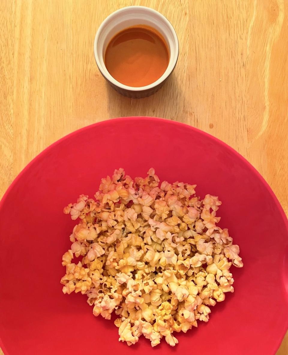 Popcorn and buffalo sauce