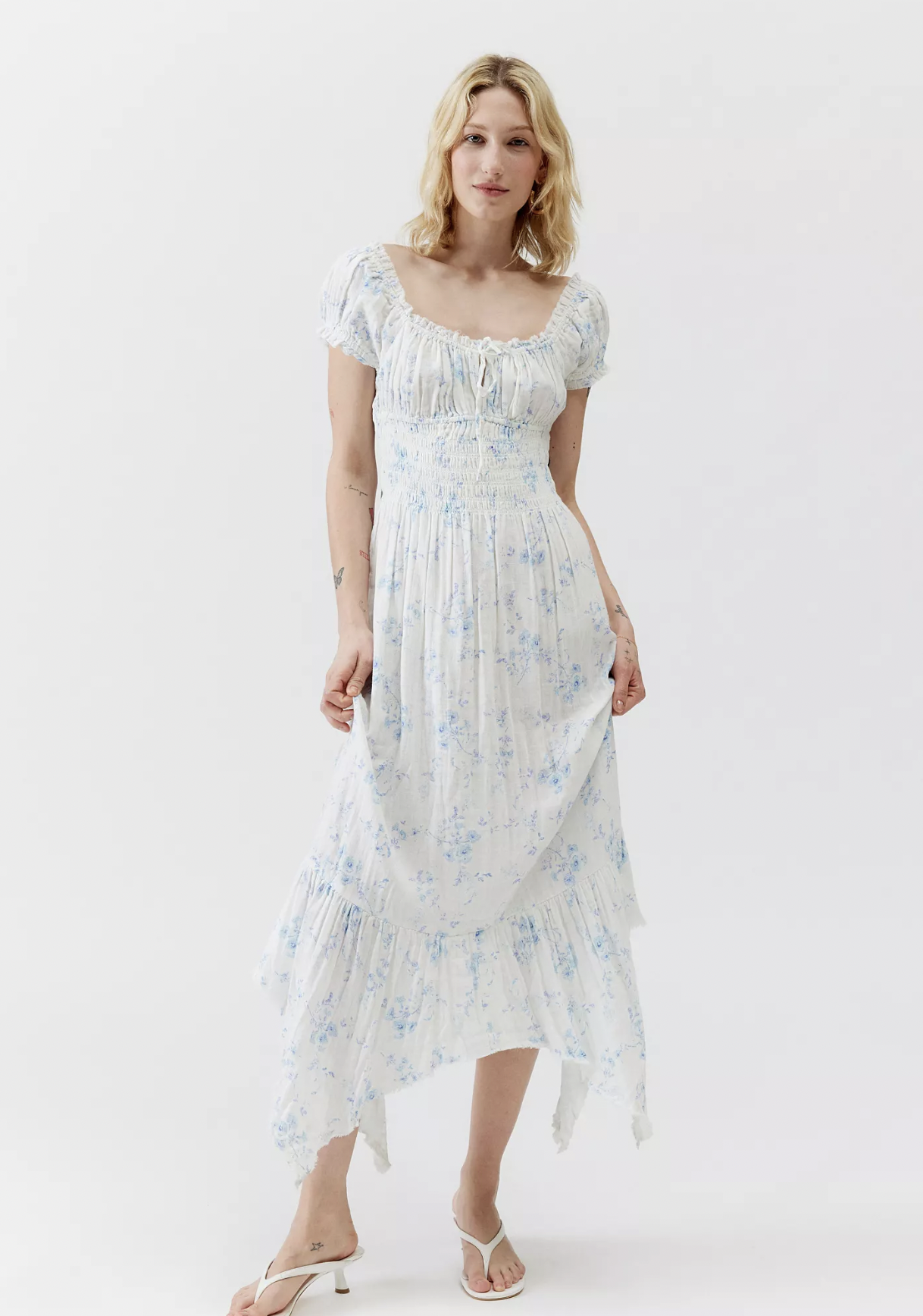 <p><a href="https://go.redirectingat.com?id=74968X1596630&url=https%3A%2F%2Fwww.urbanoutfitters.com%2Fshop%2Fkimchi-blue-suki-floral-smocked-midi-dress%3Fcolor%3D049%26size%3DM%26type%3DREGULAR%26device%3Dc%26network%3Dx%26gad_source%3D1%26gclid%3DCj0KCQjwlN6wBhCcARIsAKZvD5ho9wO5j4SDdtx7Vo6-WhOzkPWAaPrM9dvrydg_QAO2Szjfy6cqPrwaAocvEALw_wcB%26gclsrc%3Daw.ds%26quantity%3D1&sref=https%3A%2F%2Fwww.thepioneerwoman.com%2Ffashion-style%2Fa60458278%2Fbaby-shower-outfit-inspiration%2F" rel="nofollow noopener" target="_blank" data-ylk="slk:Shop Now;elm:context_link;itc:0;sec:content-canvas" class="link rapid-noclick-resp">Shop Now</a></p><p>Kimchi Blue Suki Floral Smocked Midi Dress</p><p>urbanoutfitters.com</p><p>$75.00</p>