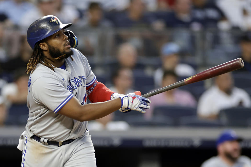 Toronto Blue Jays' Vladimir Guerrero Jr. watches his three-run home run against the New York Yankees during the second inning of a baseball game Thursday, Aug. 18, 2022, in New York. (AP Photo/Adam Hunger)