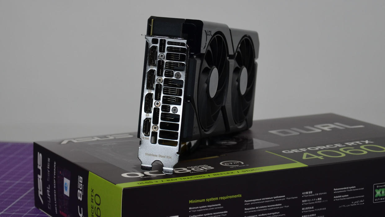  An Nvidia GeForce RTX 4060 on a table with its retail packaging. 