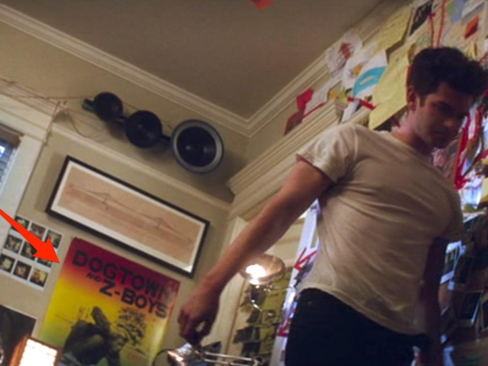 A red arrow pointing to a poster for "Dogtown and Z-Boys" in "The Amazing Spider-Man 2."