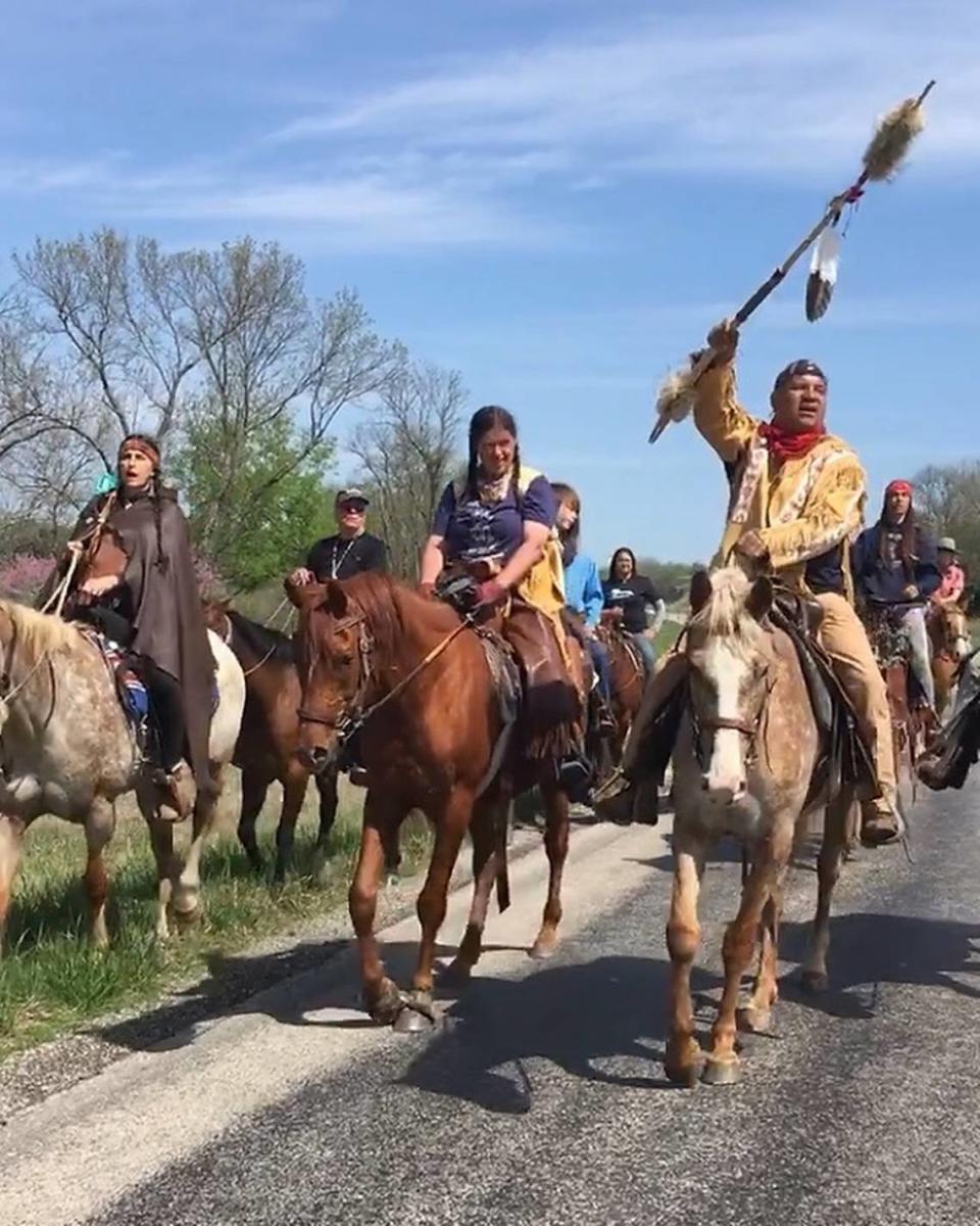 People riding horseback.