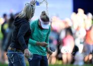 Jun 12, 2016; Sammamish, WA, USA; Brooke Henderson has water dumped on her after winning in a playoff during the final round of the KPMG Women's PGA Championship at Sahalee Country Club - South/North Course. Mandatory Credit: Kelvin Kuo-USA TODAY Sports