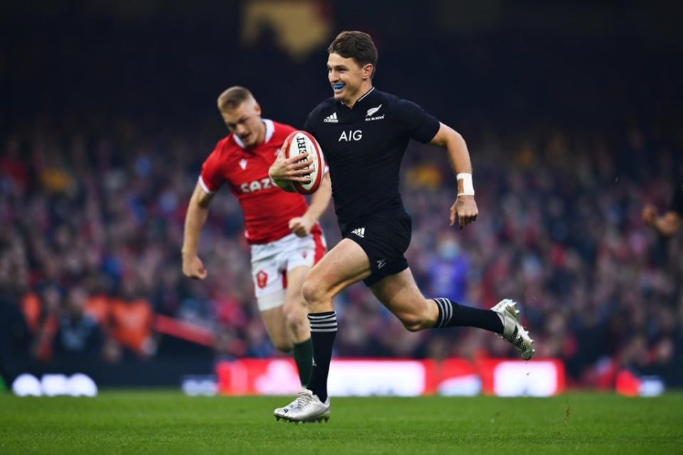 Beauden Barrett smiles as he runs in the first try (Getty Images)