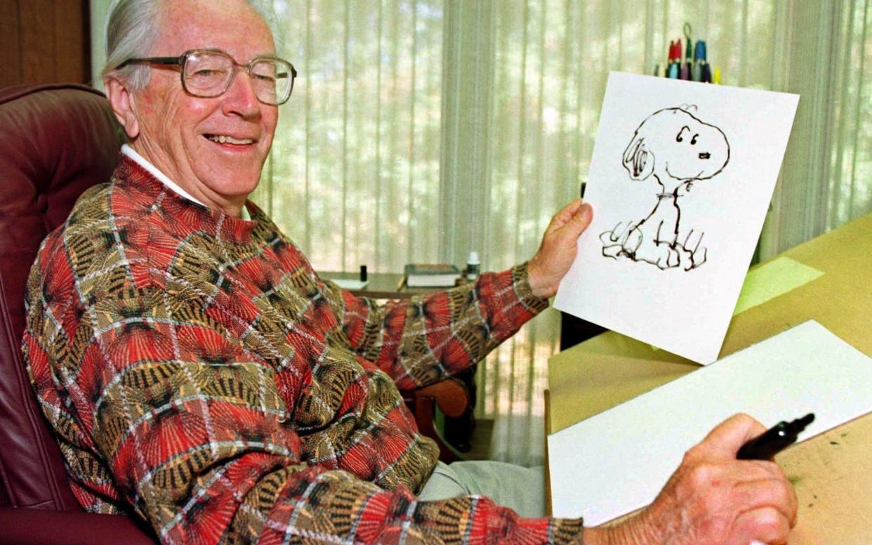 Charles Schulz in 2000 pictured in his Santa Rosa office - AP