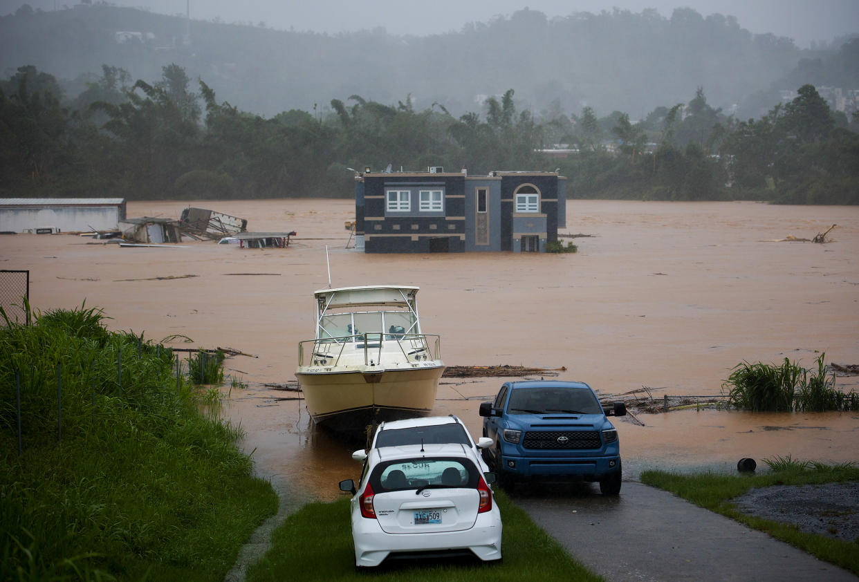 A home is submerged in floodwaters caused by Hurricane Fiona in Cayey, Puerto Rico. (Stephanie Rojas / AP Photo)