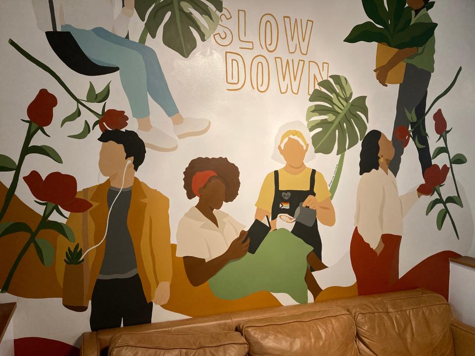 The mural on the inside of the Slow Down Coffee Co.'s wall.