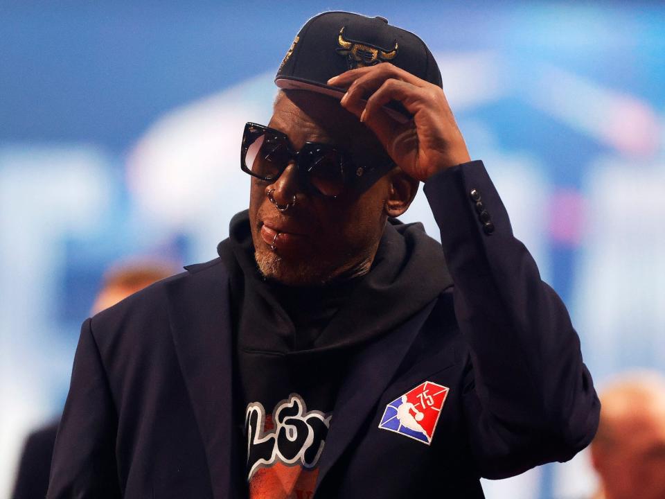 Dennis Rodman reacts after being introduced as part of the NBA 75th Anniversary Team during the 2022 NBA All-Star Game at Rocket Mortgage Fieldhouse on February 20, 2022 in Cleveland, Ohio.