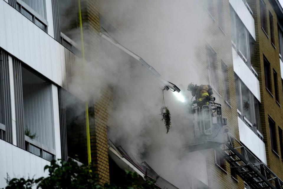 Dozens of firefighters were sent to the block (TT News Agency/AFP/Getty)