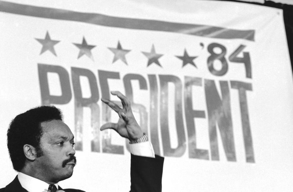 FILE - Rev. Jesse Jackson addresses supporters in Washington, Thursday, Nov. 3, 1983, after he announced he would seek the Democratic presidential nomination. Jackson plans to step down from leading the Chicago civil rights organization Rainbow PUSH Coalition he founded in 1971, his son's congressional office said Friday, July 14, 2023. (AP Photo/Ira Schwarz, File)