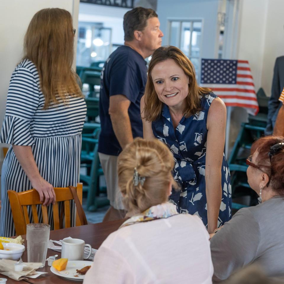 Alice Rolli speaks with community members during a breakfast at Golden Corral in Hermitage Saturday, August 26, 2023.