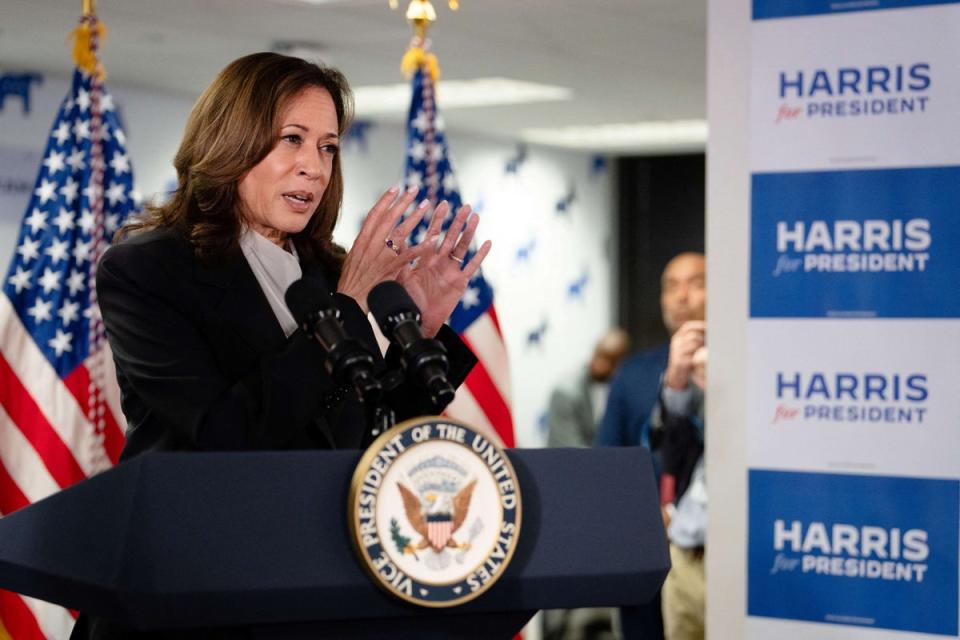 The first appearance of the new Harris for President logos, still wet from the printer when they arrived (POOL/AFP via Getty Images)