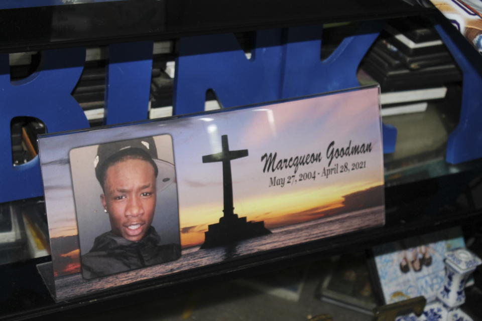 A photo of Marcqueon Jaquez Gooman sits in front of letters that spell out his nickname "Binky" at this home in Charlotte, N.C, on July 8, 2021. Goodman was shot and killed in Charlotte on April 29, 2021. Homicide rates in many American cities have continued to rise although not as precipitously as the double-digit jumps seen in 2020 and still below the violence of the mid-90s. (AP Photo/Skip Foreman)