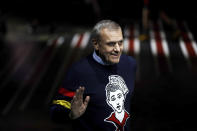 Designer Jean-Charles de Castelbajac waves to spectators at the end of the Benetton women's Fall/Winter 2020/2021 fashion show, that was presented in Milan, Italy, Thursday, Feb. 20, 2020. (AP Photo/Luca Bruno).