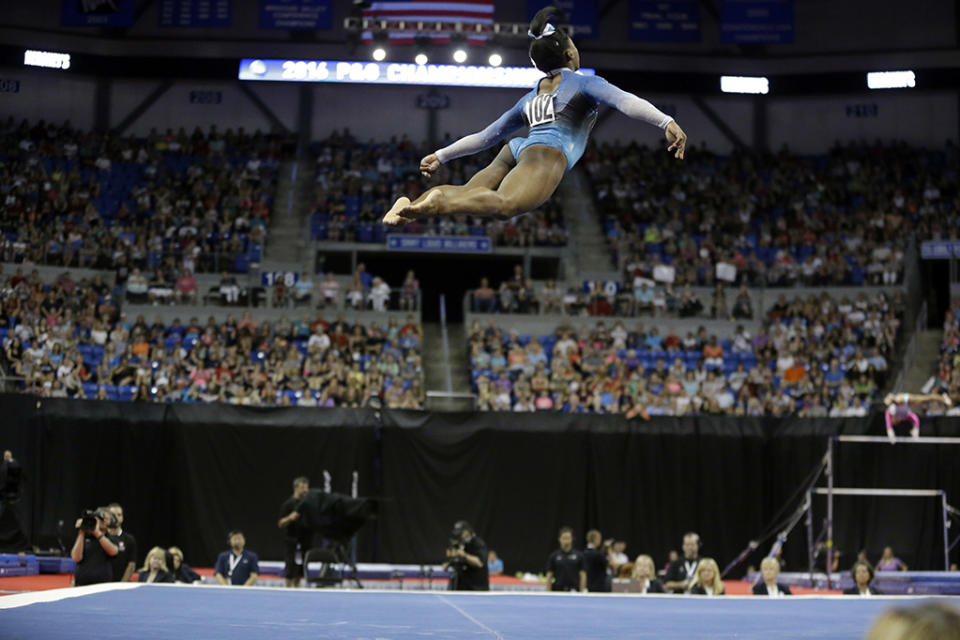 <p>Simone Biles competes in the floor exercise during the U.S. women’s gymnastics championships on June 26, 2016, in St. Louis. </p>