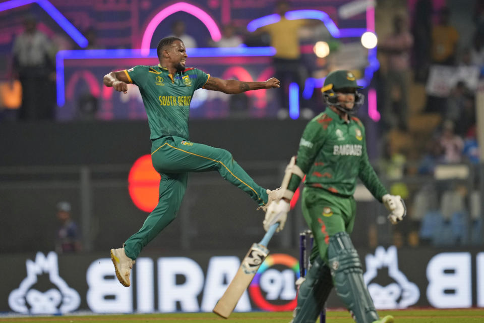 South Africa's Lizaad Williams celebrates the wicket of Bangladesh's captain Shakib Al Hasan during the ICC Men's Cricket World Cup match between Bangladesh and South Africa in Mumbai, India, Tuesday, Oct. 24, 2023. (AP Photo/Rajanish Kakade)