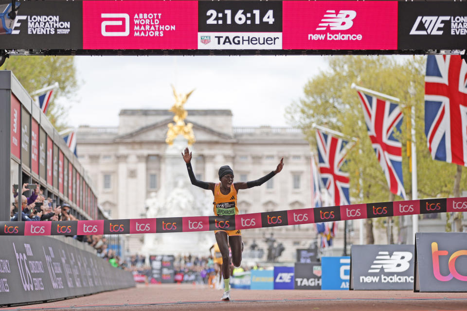 Peres Jepchirchir of Kenya is about to cross the finish line to win the women's race at the London Marathon in London, Sunday, April 21, 2024.(AP Photo/David Cliff)